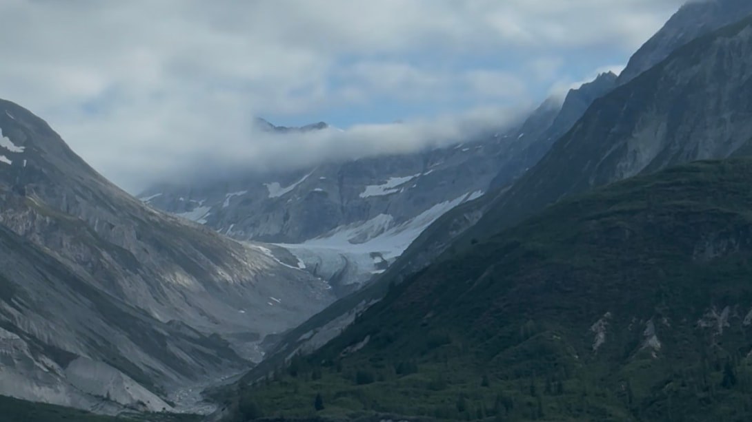 Why Do Some Glaciers Look Black Instead of Blue?